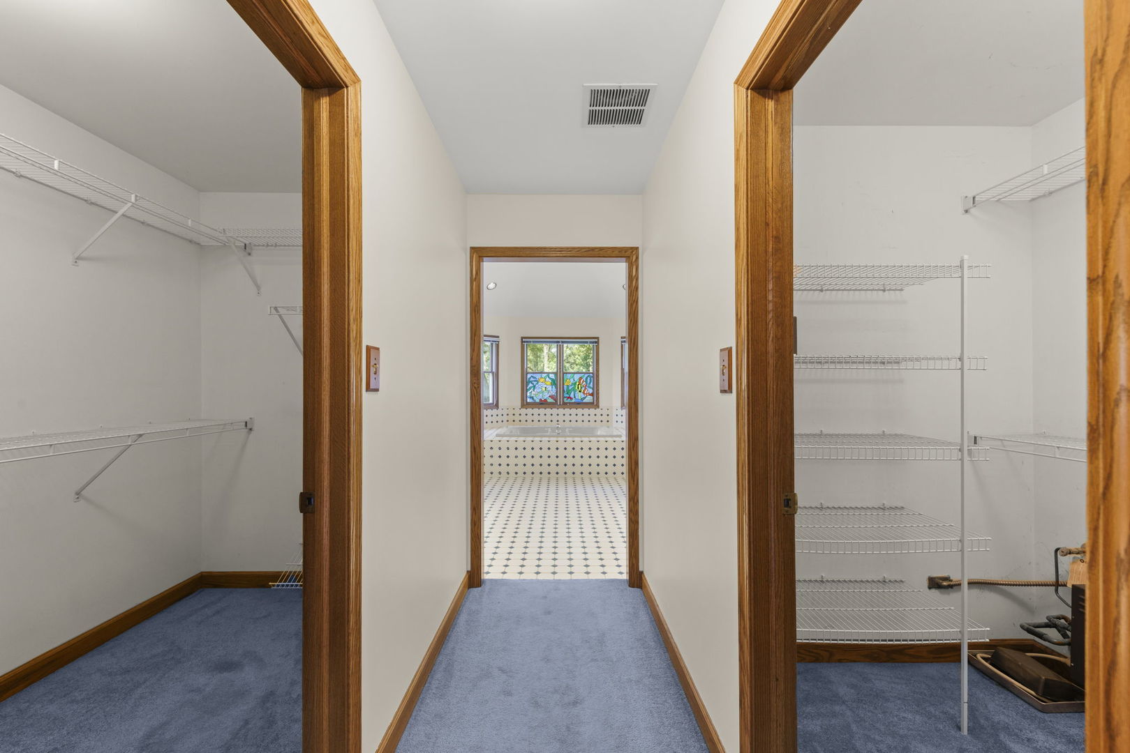 18040 Perth Avenue Homewood, IL 60430 - Photo 25 of 44 a view of a hallway with wooden floor and a bathroom