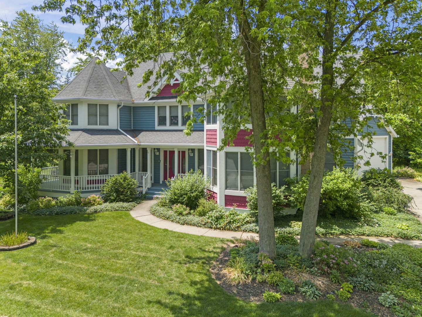 18040 Perth Avenue Homewood, IL 60430 - Photo 37 of 44 a front view of a house with a yard and potted plants