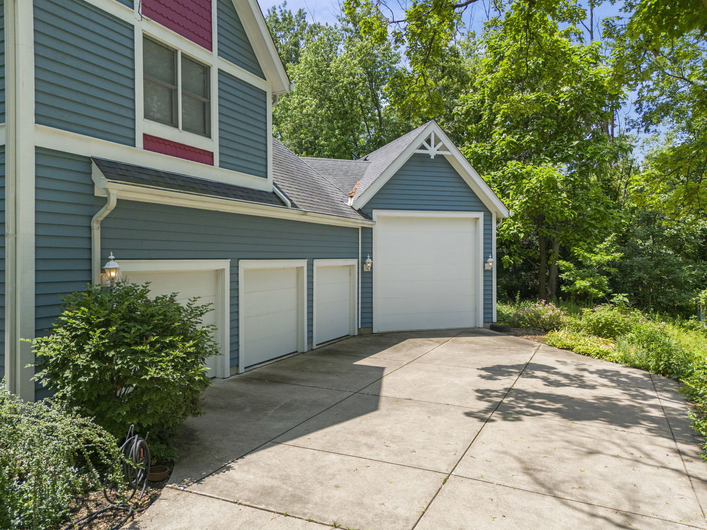 18040 Perth Avenue Homewood, IL 60430 - Photo 38 of 44 a front view of a house with a yard and trees