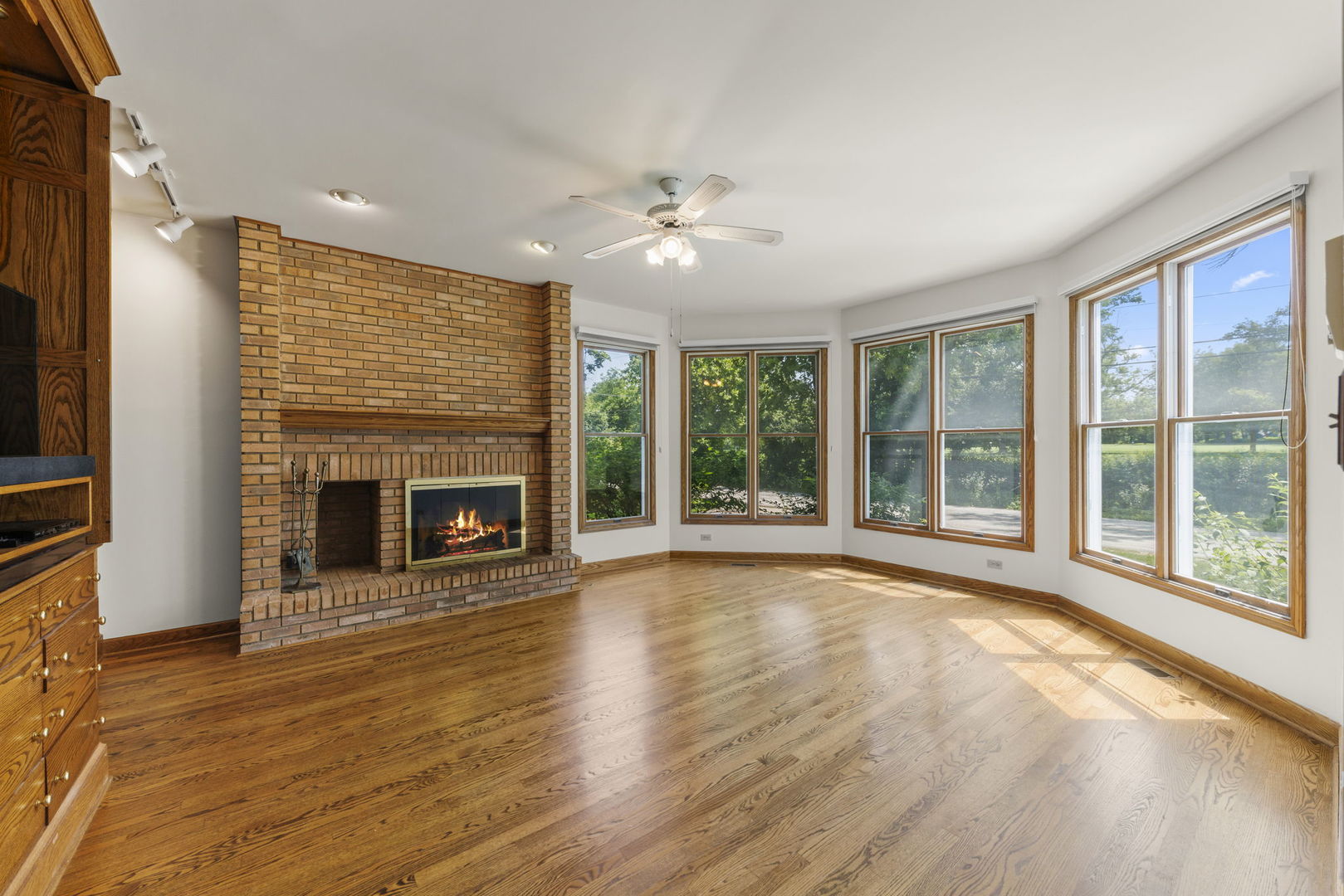 18040 Perth Avenue Homewood, IL 60430 - Photo 5 of 44 a view of an empty room with a fireplace and a window