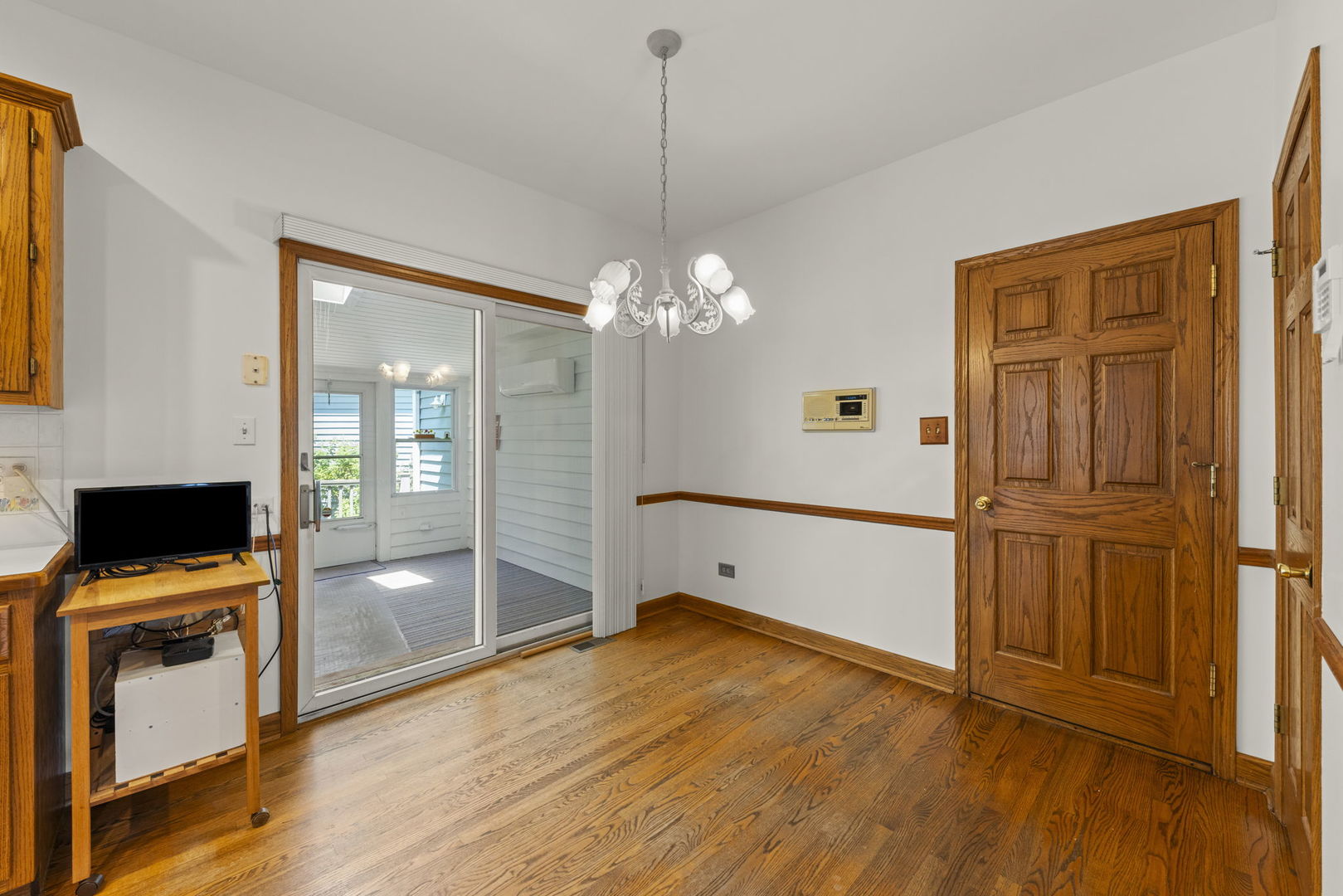 18040 Perth Avenue Homewood, IL 60430 - Photo 9 of 44 a view of a room with wooden floor and cabinet