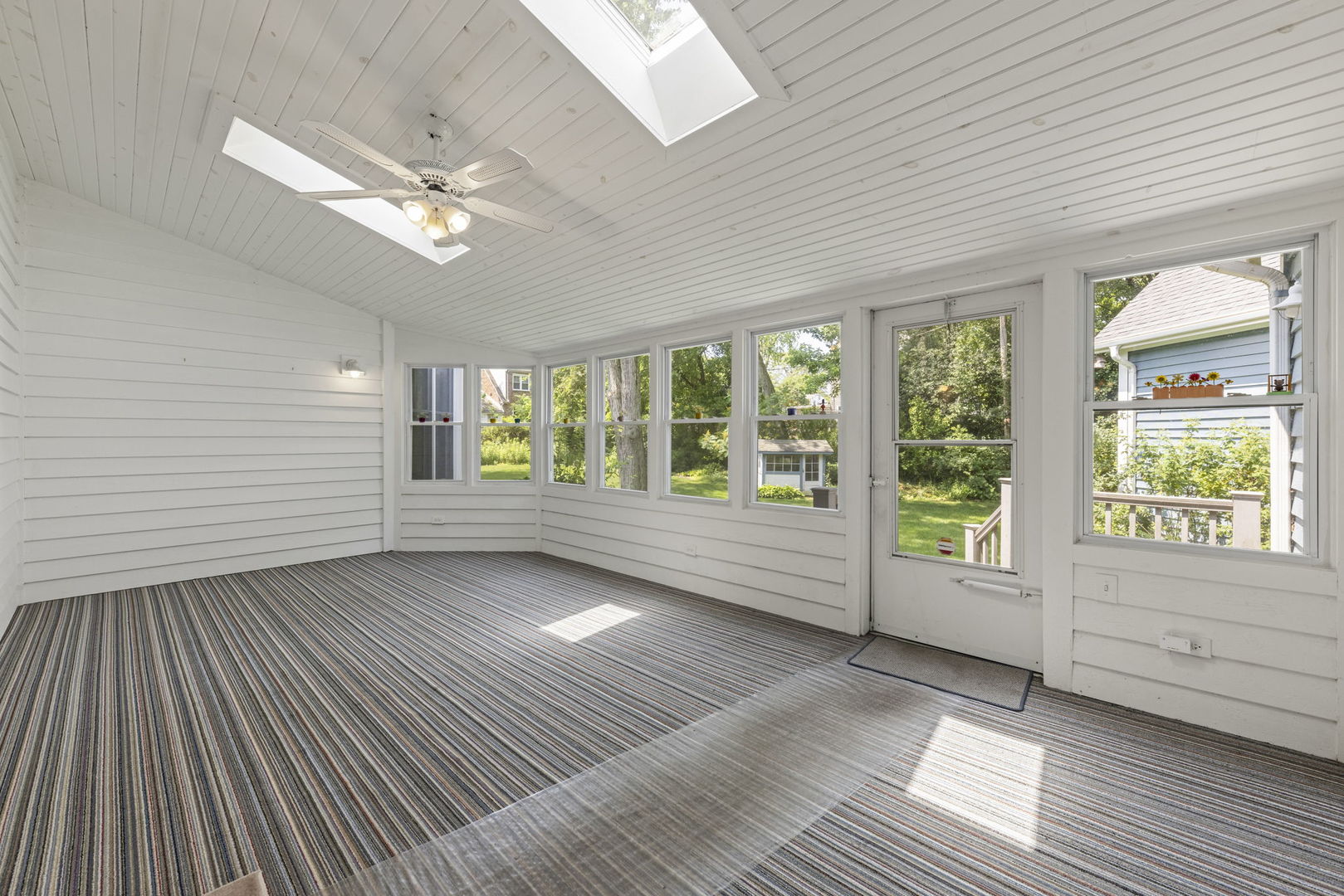 18040 Perth Avenue Homewood, IL 60430 - Photo 10 of 44 a view of an empty room with a window and wooden floor