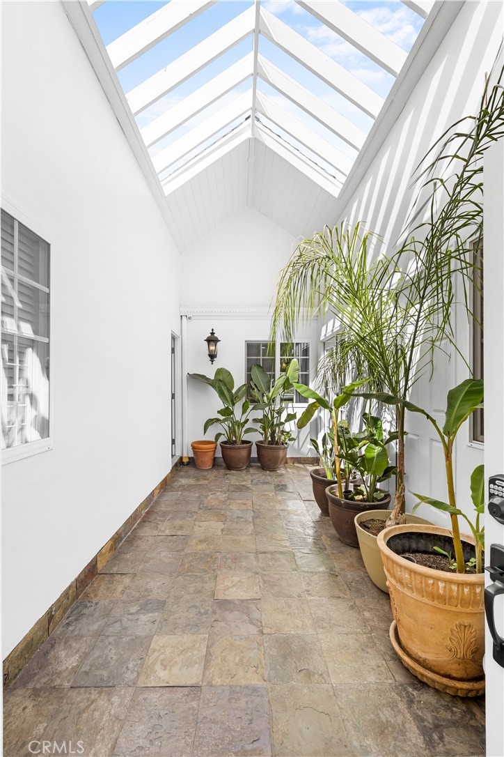26096 Adamor Road Calabasas, CA 91302 - Photo 4 of 61 View from front doors into 16'x8' atrium with slate floor.