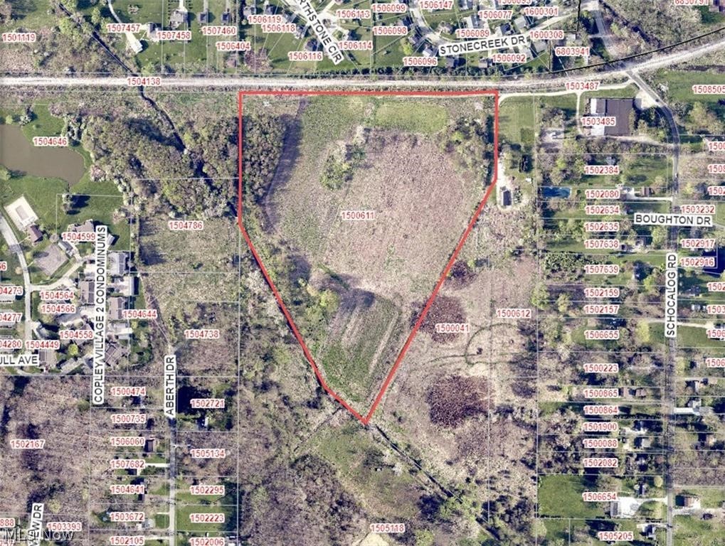 V/l Schocalog Road Akron, OH 44320 - Photo 7 of 7 Aerial Map displaying a large parcel of land outlined in red, with surrounding properties and street names visible
