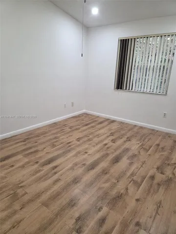 a bathroom with a shower and a bathtub