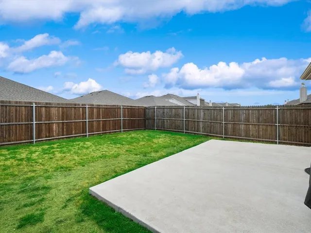 a view of a backyard with a garden