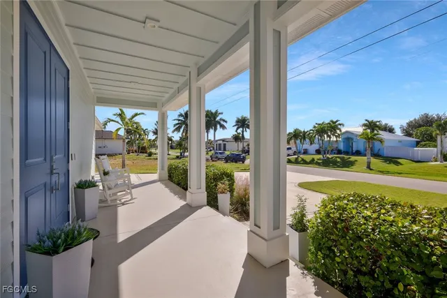 a kitchen with stainless steel appliances granite countertop wooden cabinets a stove top oven a sink and dishwasher