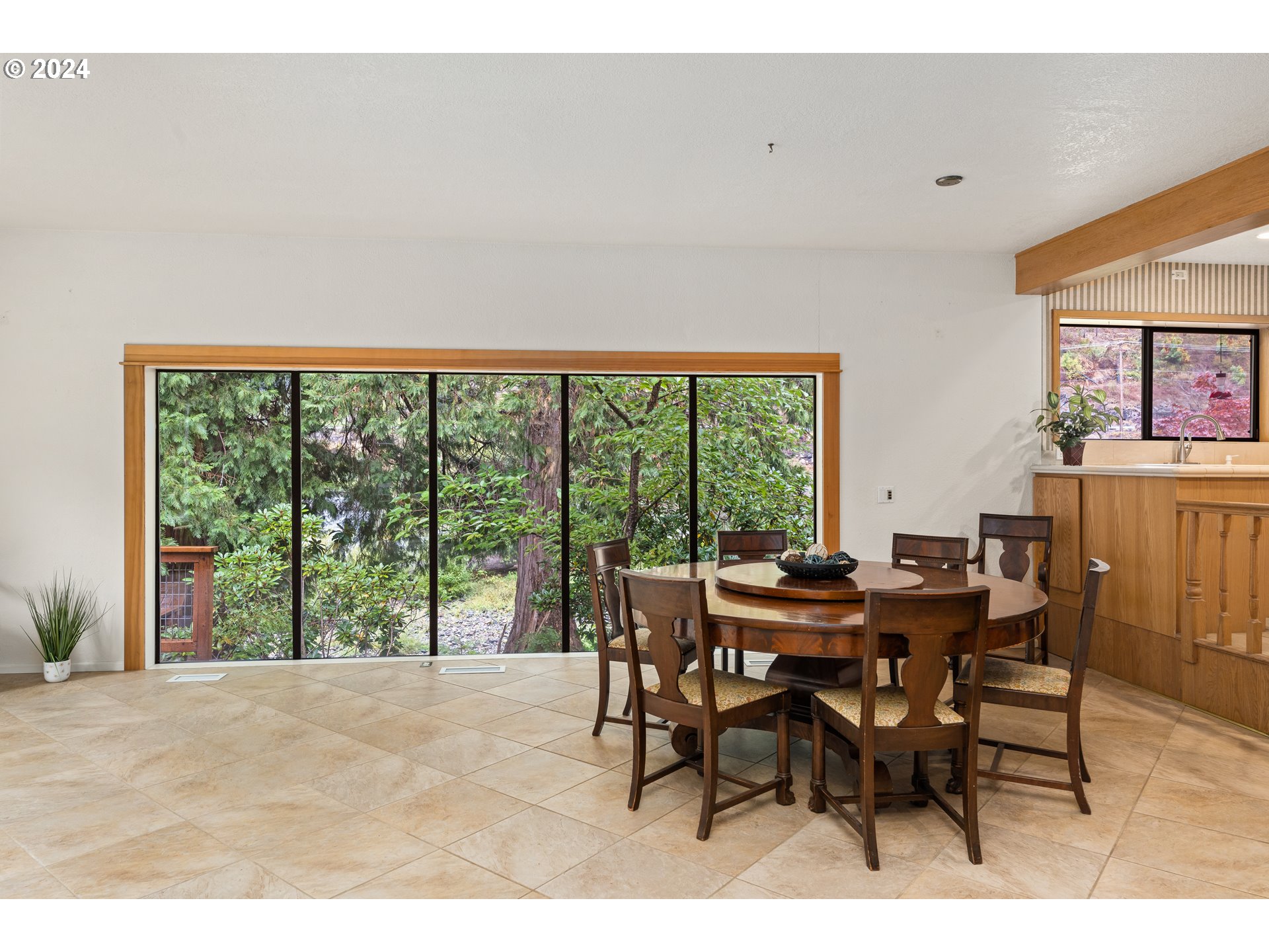 91070 Leashore Drive Vida, OR 97488 - Photo 17 of 43 a view of a dining room with furniture and a window