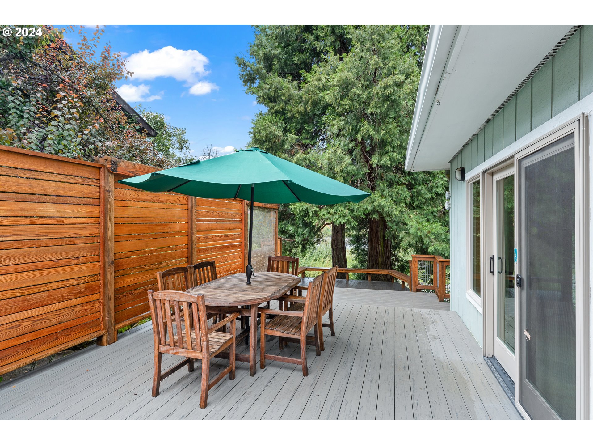 91070 Leashore Drive Vida, OR 97488 - Photo 19 of 43 a view of a backyard with furniture and a patio