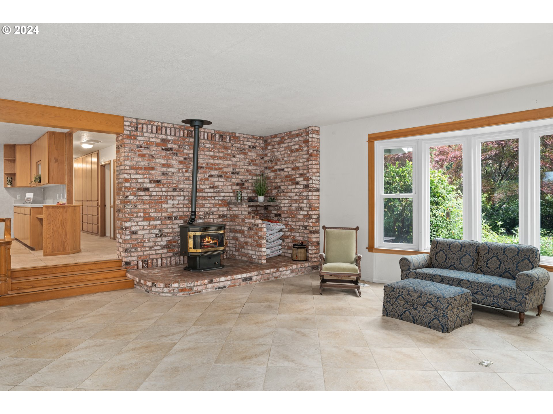 91070 Leashore Drive Vida, OR 97488 - Photo 24 of 43 a living room with furniture and large windows