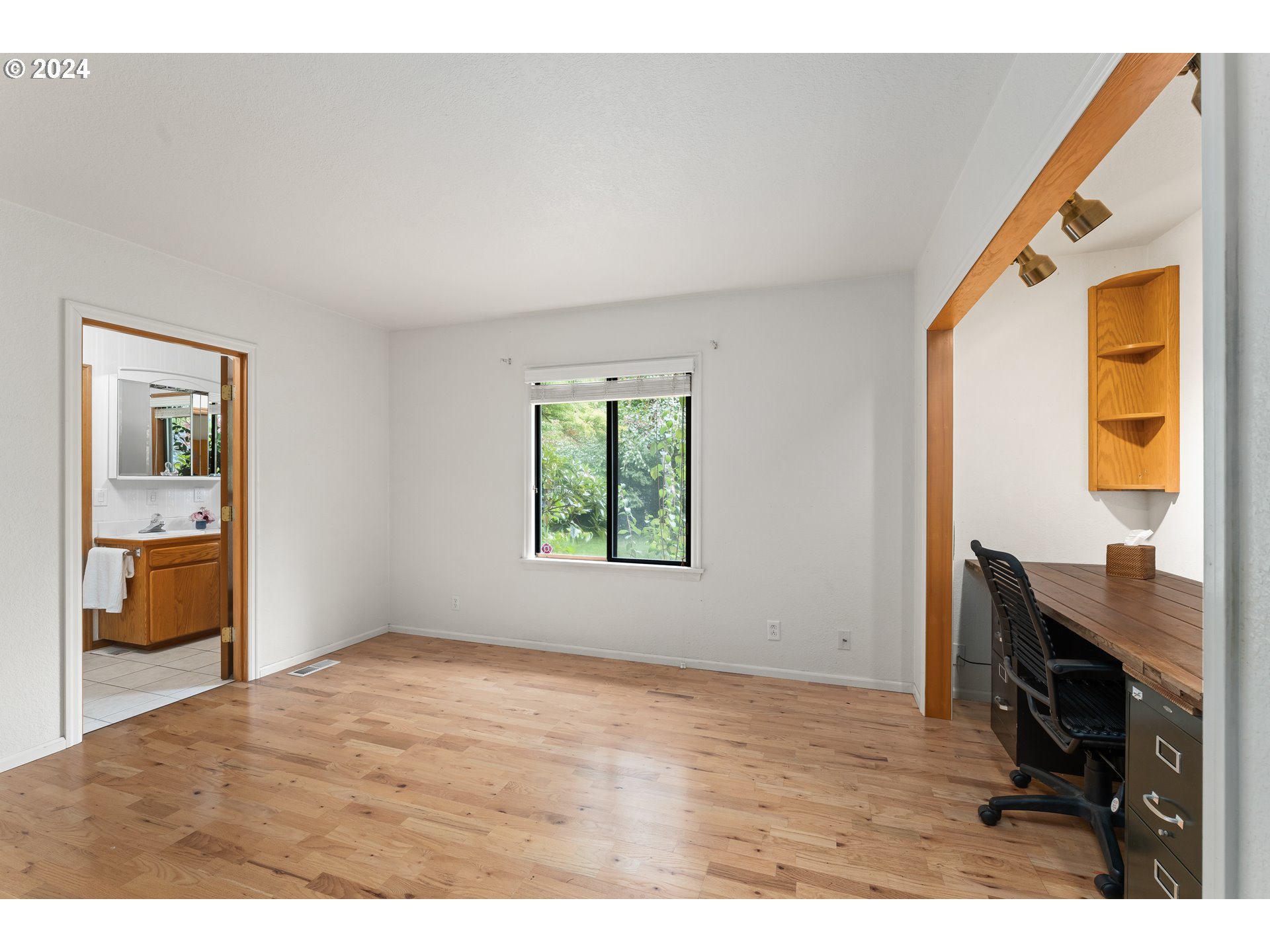 91070 Leashore Drive Vida, OR 97488 - Photo 26 of 43 a view of an empty room with a window