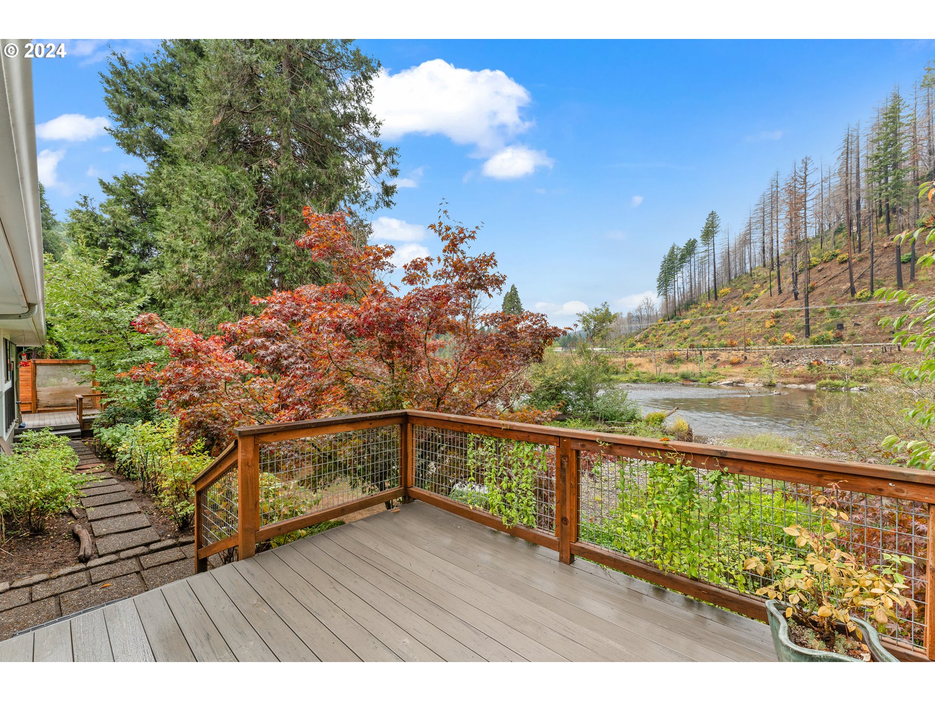 91070 Leashore Drive Vida, OR 97488 - Photo 33 of 43 a view of a balcony with wooden floor