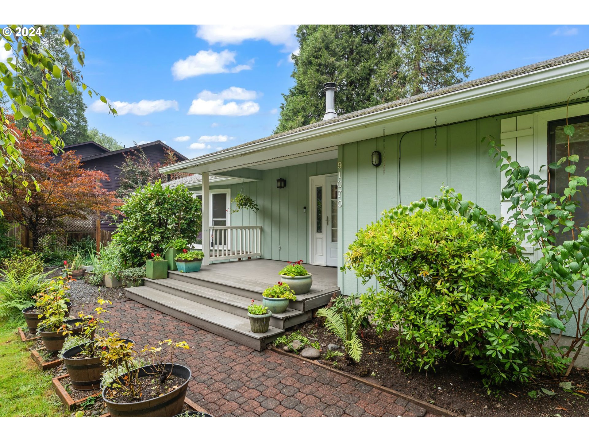 91070 Leashore Drive Vida, OR 97488 - Photo 6 of 43 a backyard of a house with outdoor seating