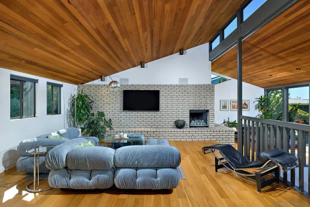 a outdoor space with patio furniture and a fireplace