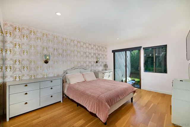 a bathroom with a bathtub and a sink
