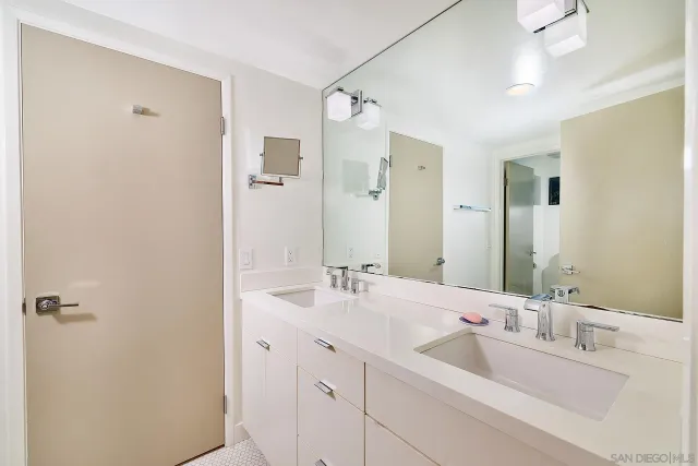 an aerial view of a house with garden space and street view