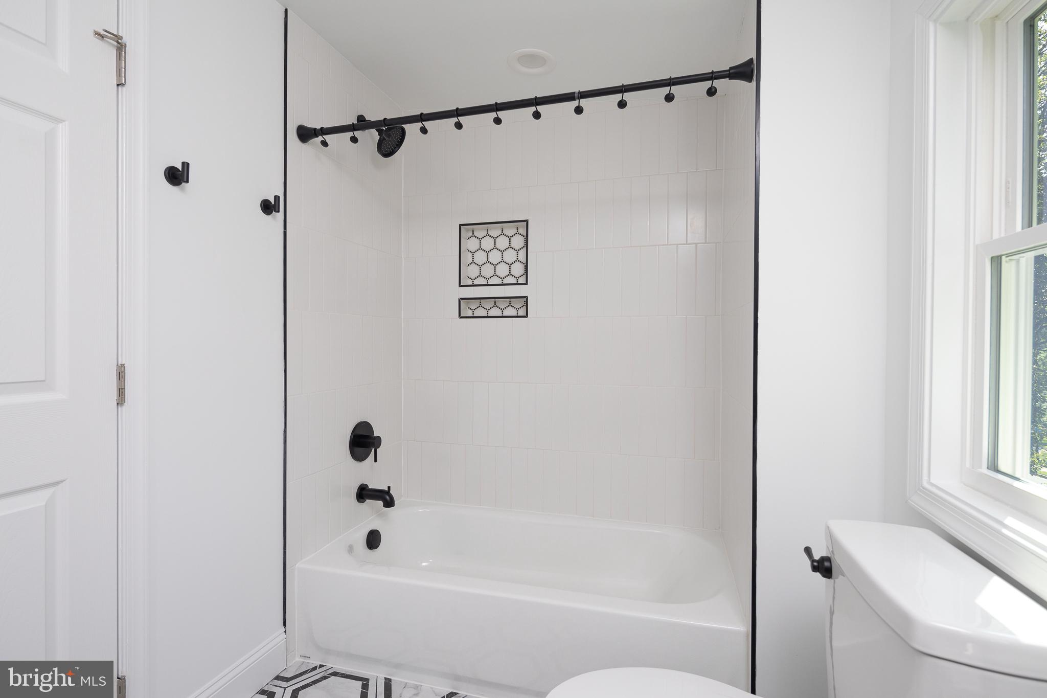 6720 Barrett Road Falls Church, VA 22042 - Photo 22 of 49 NOTE: CUSTOM TILE WORK IN PRIMARY BATH