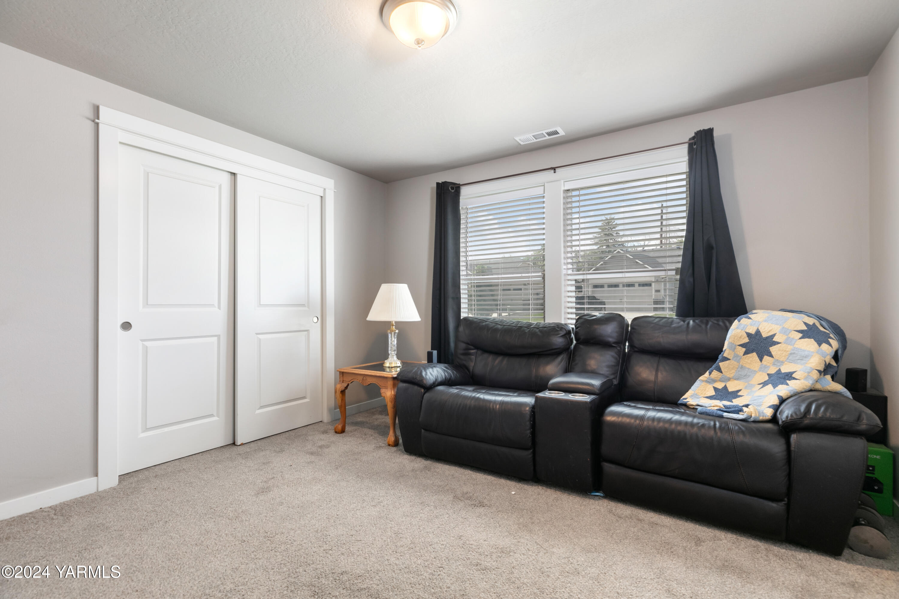 6210 Cottonwood Road Yakima, WA 98903 - Photo 12 of 18 a living room with furniture and a window