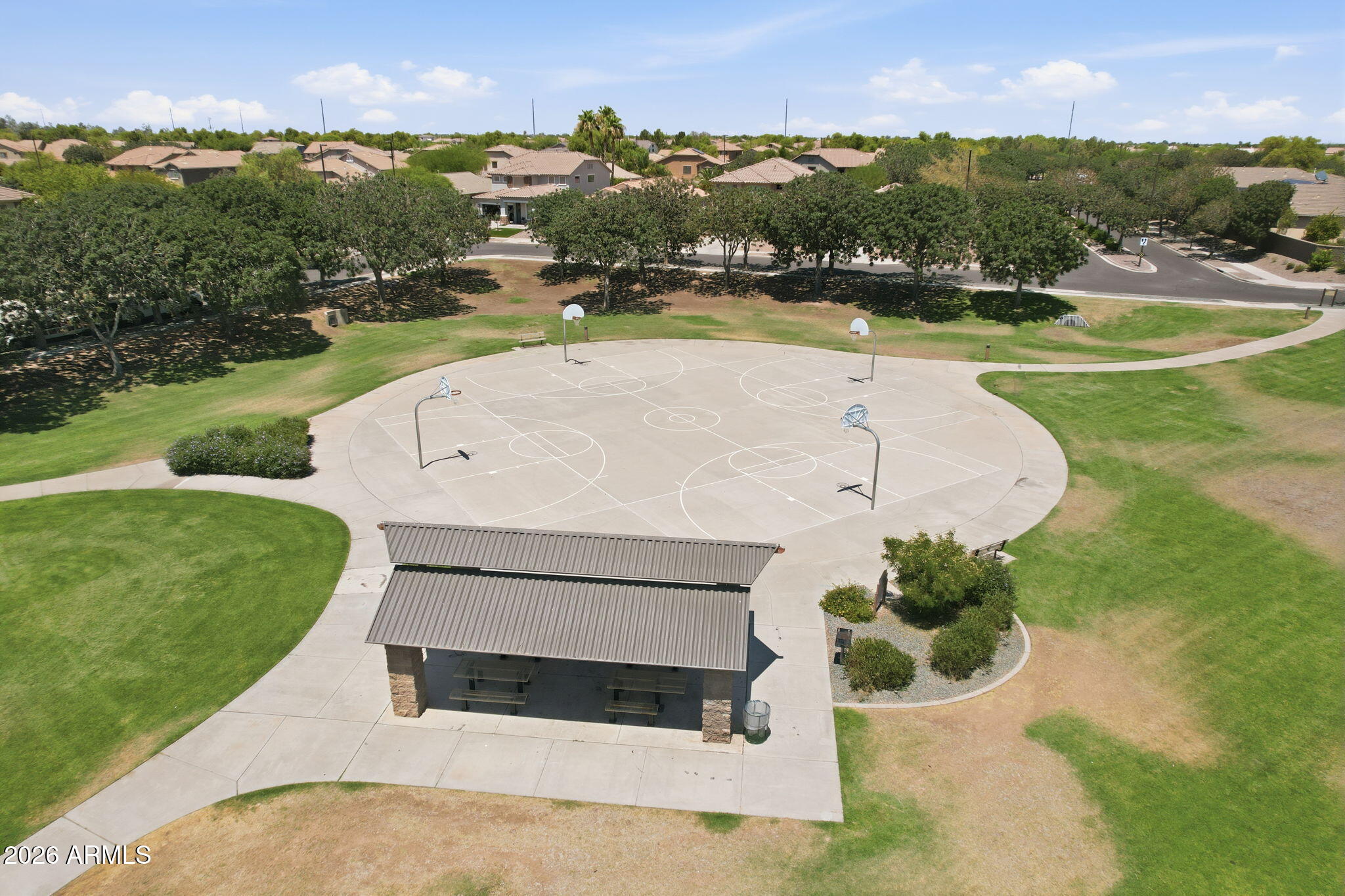 4184 East Trigger Way Gilbert, AZ 85297 - Photo 45 of 51 an aerial view of residential houses with outdoor space and swimming pool