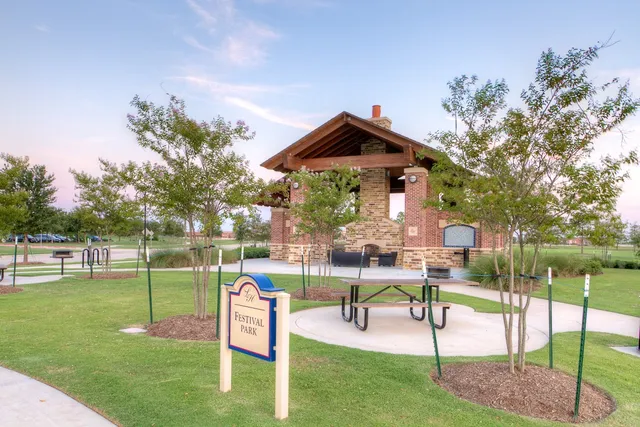 a view of swimming pool with outdoor seating and yard
