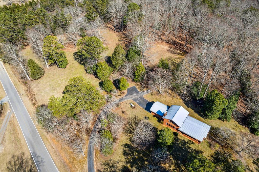 855 Lickskillet Road Epworth, GA 30541 - Photo 4 of 35 an aerial view of a house with a yard