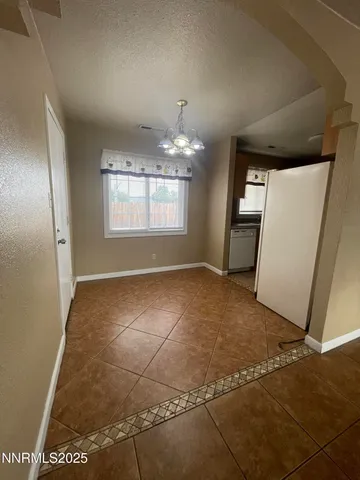a view of a livingroom with a chandelier