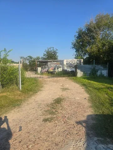 a view of a lake with a yard