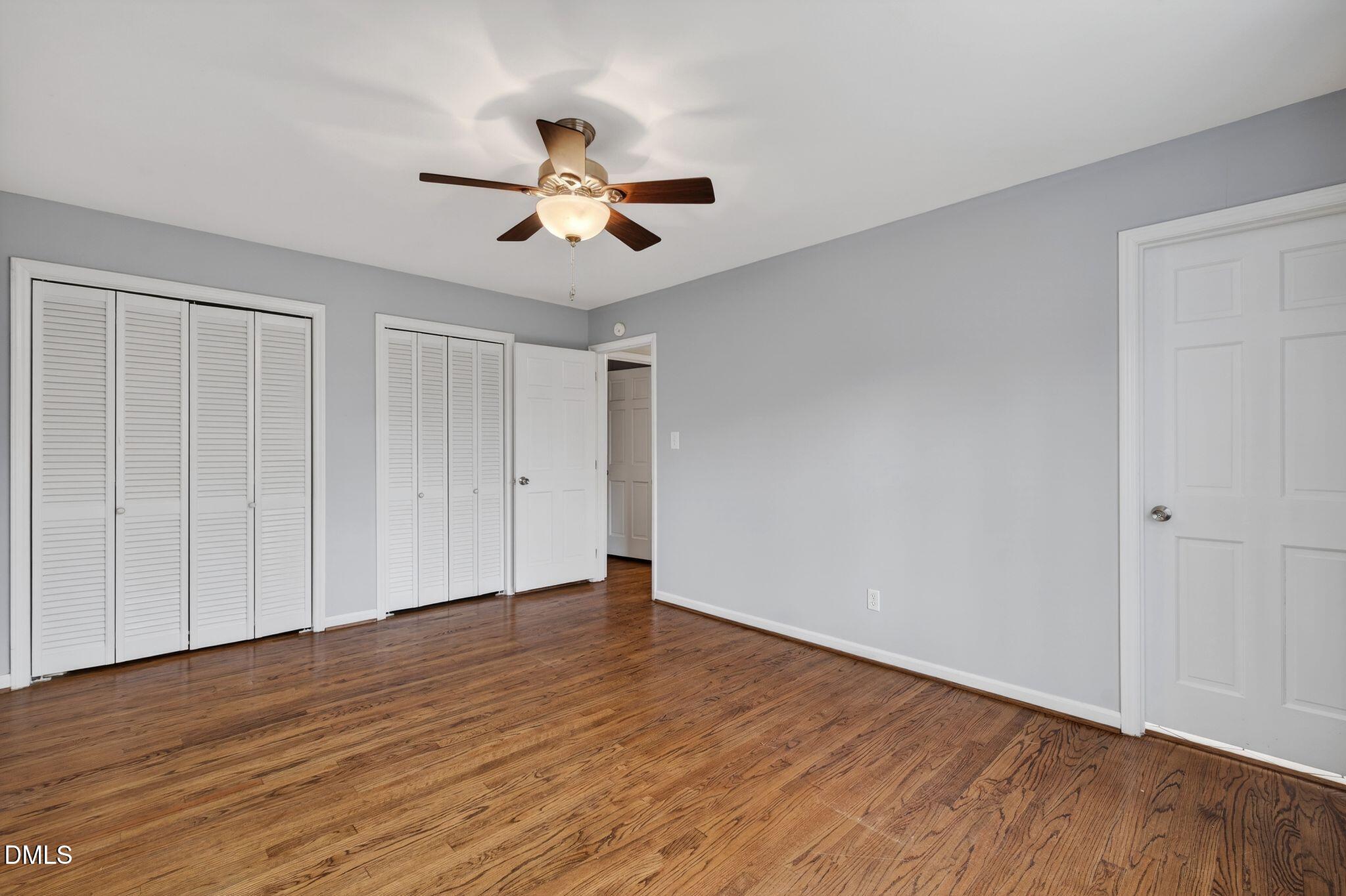 1201 Chardon Court Raleigh, NC 27609 - Photo 22 of 47 a view of an empty room with wooden floor