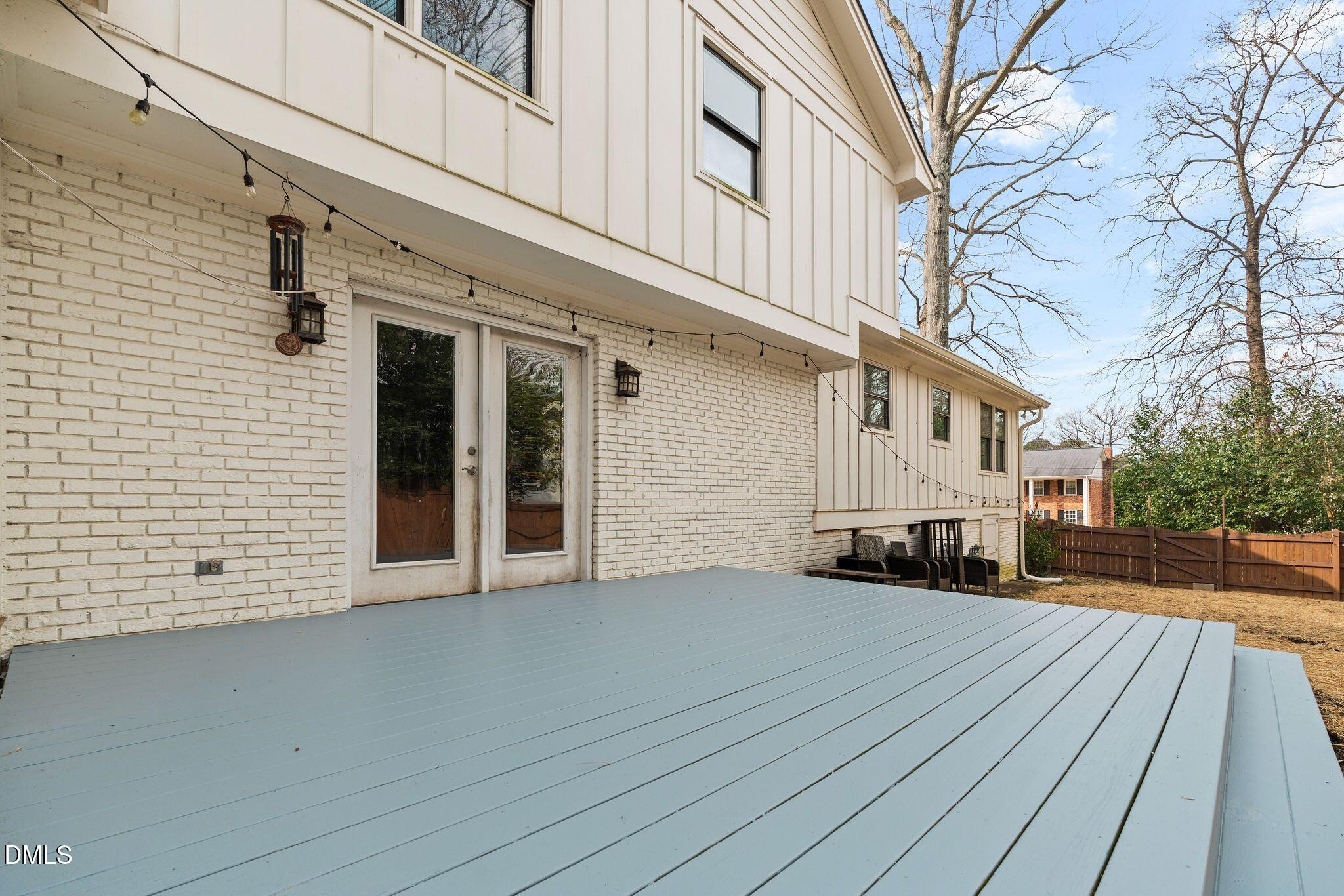 1201 Chardon Court Raleigh, NC 27609 - Photo 30 of 47 a view of a house with a yard