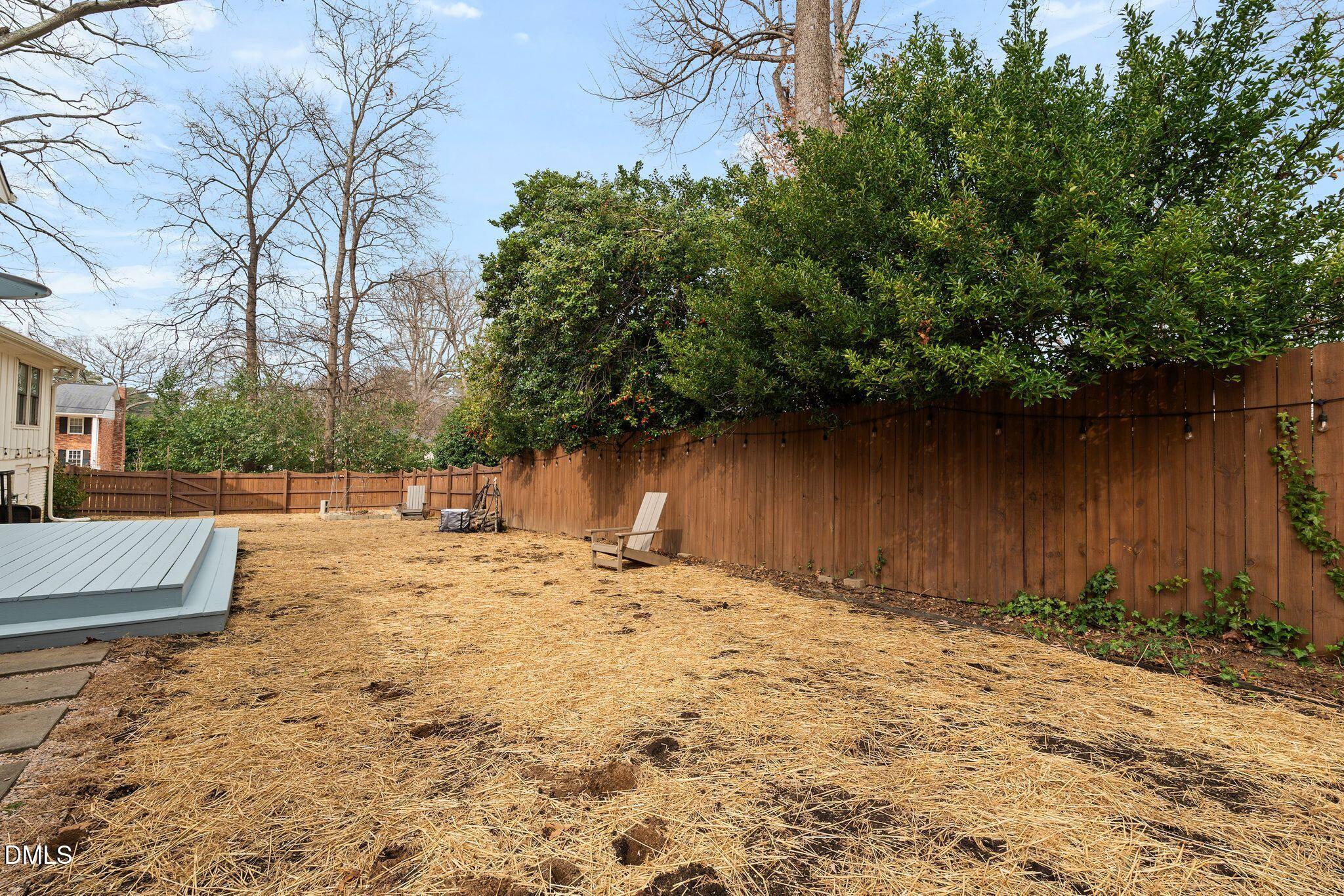 1201 Chardon Court Raleigh, NC 27609 - Photo 34 of 47 a view of yard covered with snow in front of house