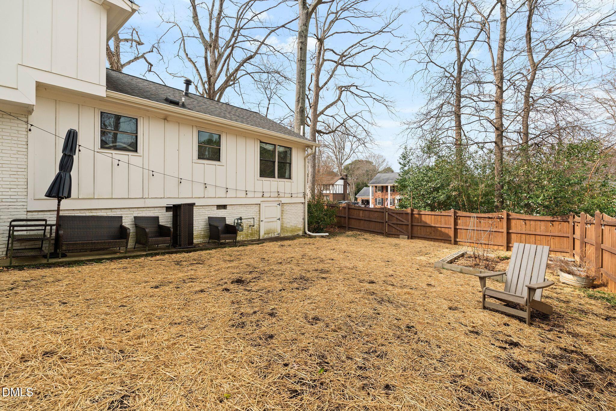 1201 Chardon Court Raleigh, NC 27609 - Photo 36 of 47 a view of a terrace with chairs and refrigerator