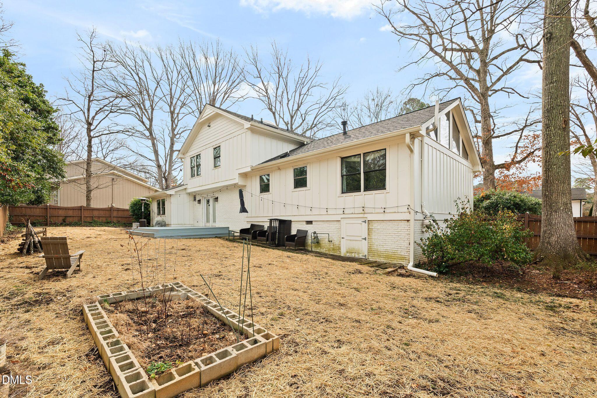 1201 Chardon Court Raleigh, NC 27609 - Photo 37 of 47 a view of a house with snow on the road