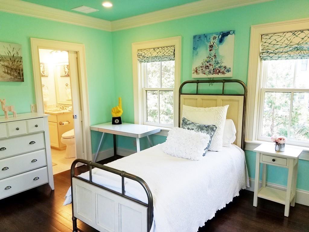 39 Bloomfield Street Lexington, MA 02421 - Photo 20 of 42 a bedroom with a bed and a window