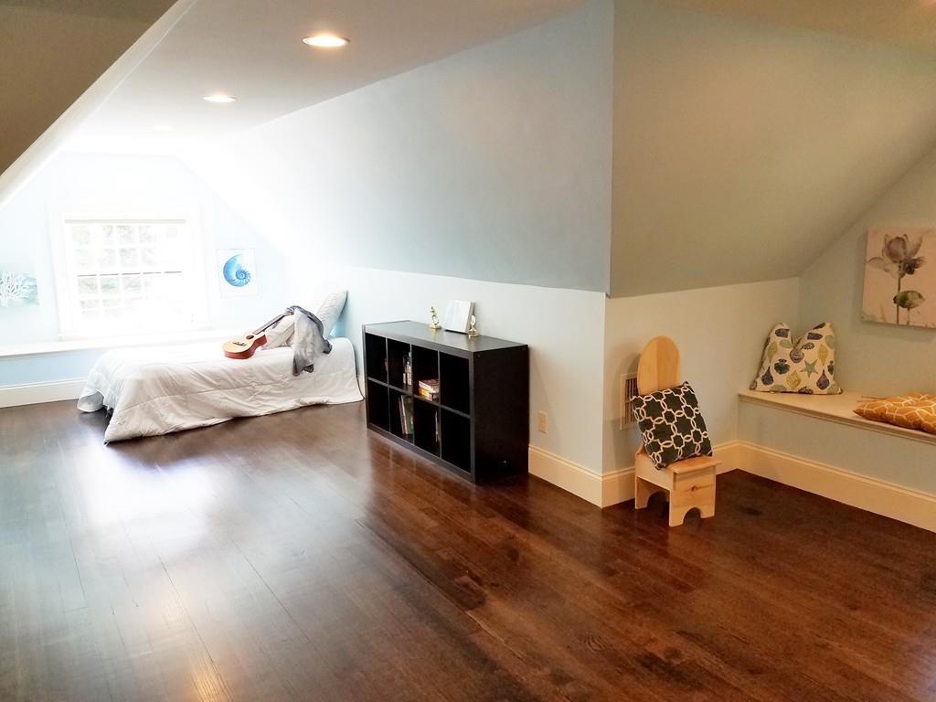 39 Bloomfield Street Lexington, MA 02421 - Photo 28 of 42 a living room with furniture and dresser with wooden floor