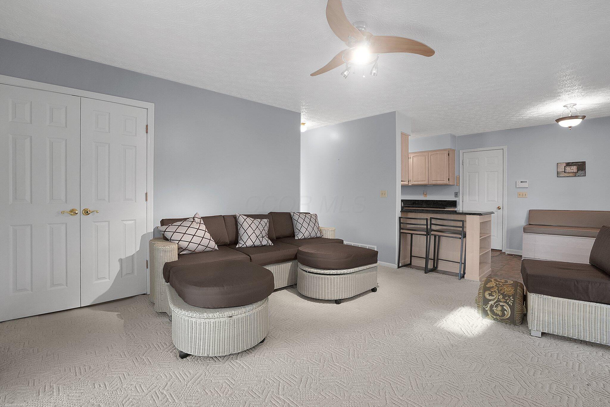 138 South Spring Road Westerville, OH 43081 - Photo 12 of 42 Living Room Leading to Three Season Room