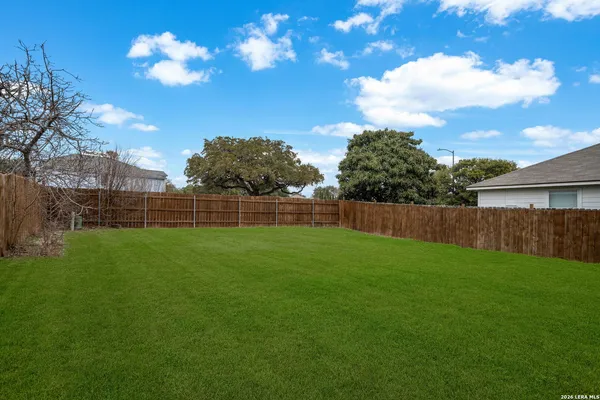 a view of a backyard with a garden