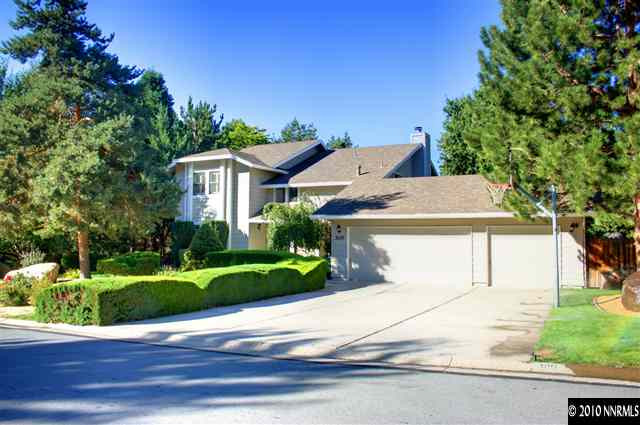 300 Cliff View Drive Reno, NV 89523 - Photo 1 of 9 a front view of a house with a yard garage and outdoor seating