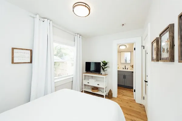 a room with furniture and a rug