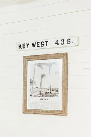 a kitchen with stainless steel appliances a refrigerator sink and cabinets