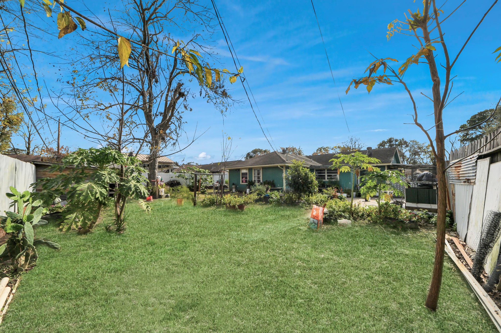 9701 Foredale Street Houston, TX 77075 - Photo 30 of 32 a backyard of a house with table and chairs