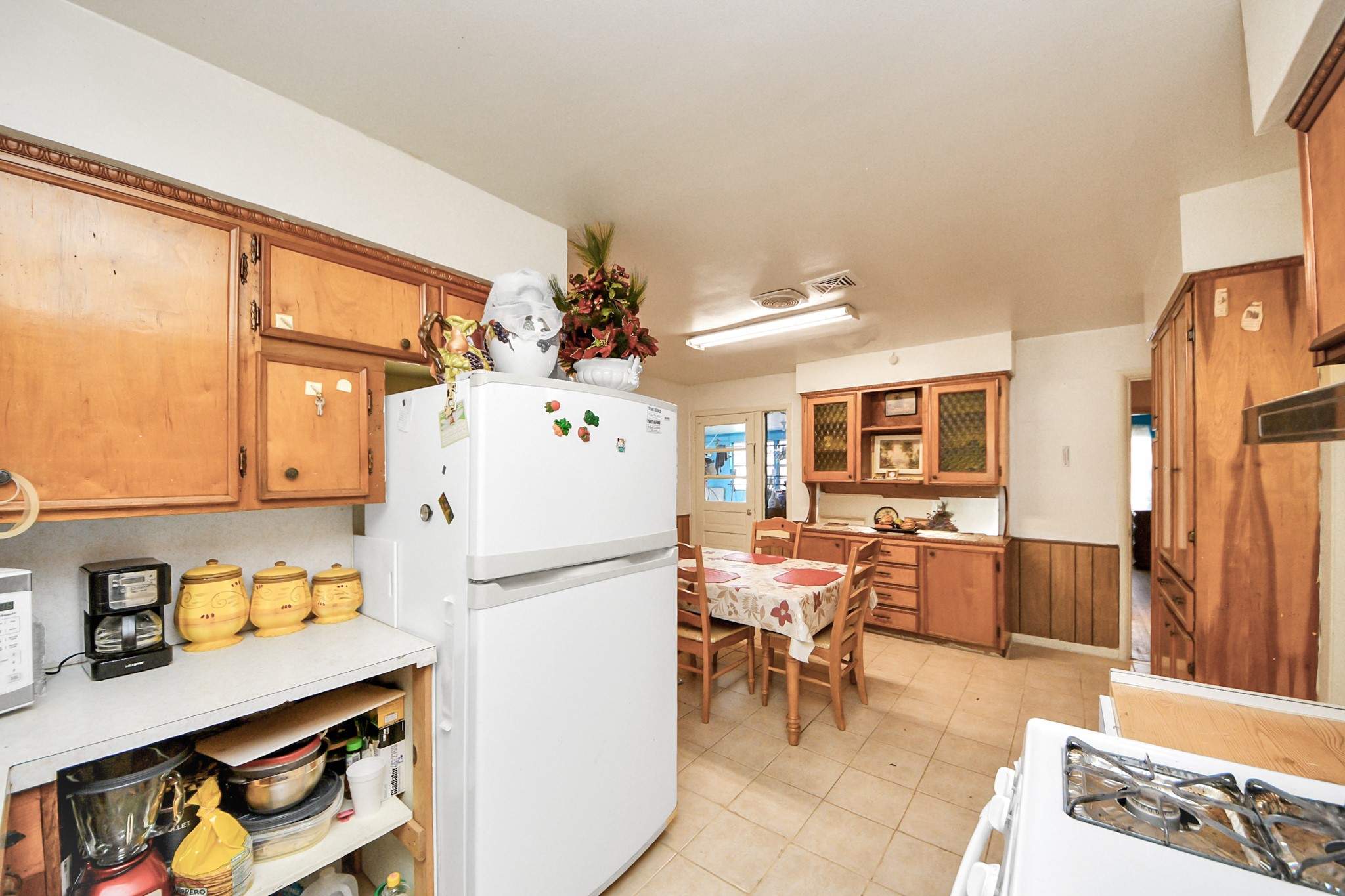 9701 Foredale Street Houston, TX 77075 - Photo 9 of 32 a kitchen with stainless steel appliances granite countertop a refrigerator and a stove top oven