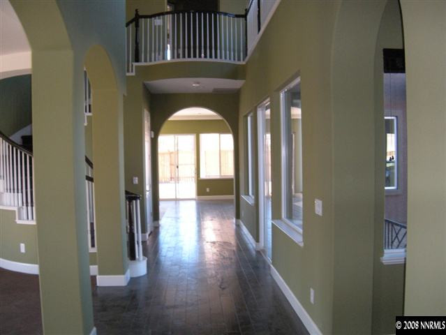 9875 Copenhagen Way Reno, NV 89521 - Photo 4 of 9 a view of entryway with wooden floor