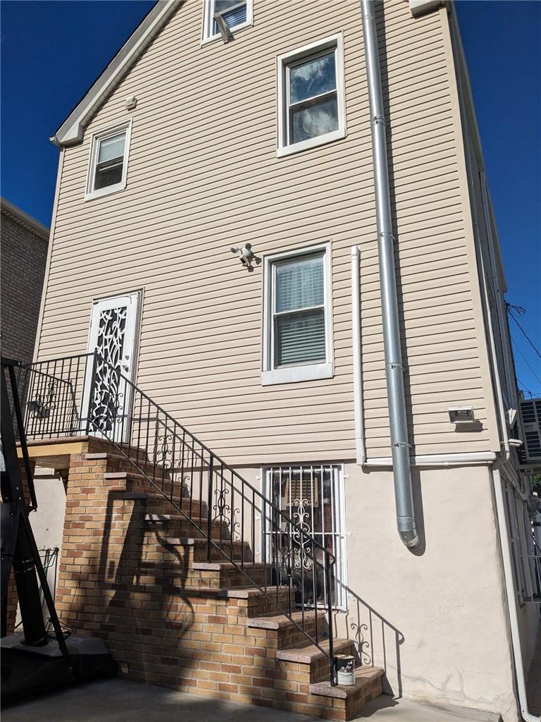 2058 Ryer Avenue Bronx, NY 10457 - Photo 2 of 2 View of rear view of house