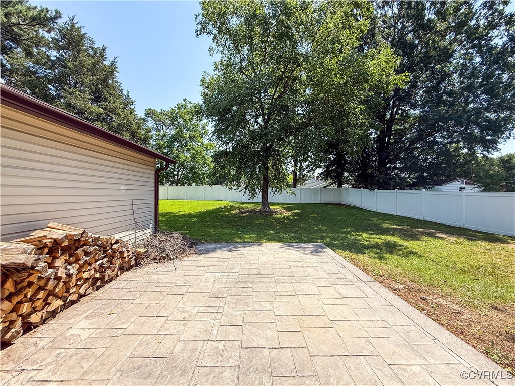 7908 Capistrano Drive Richmond, VA 23227 - Photo 14 of 22 a view of a backyard with a garden
