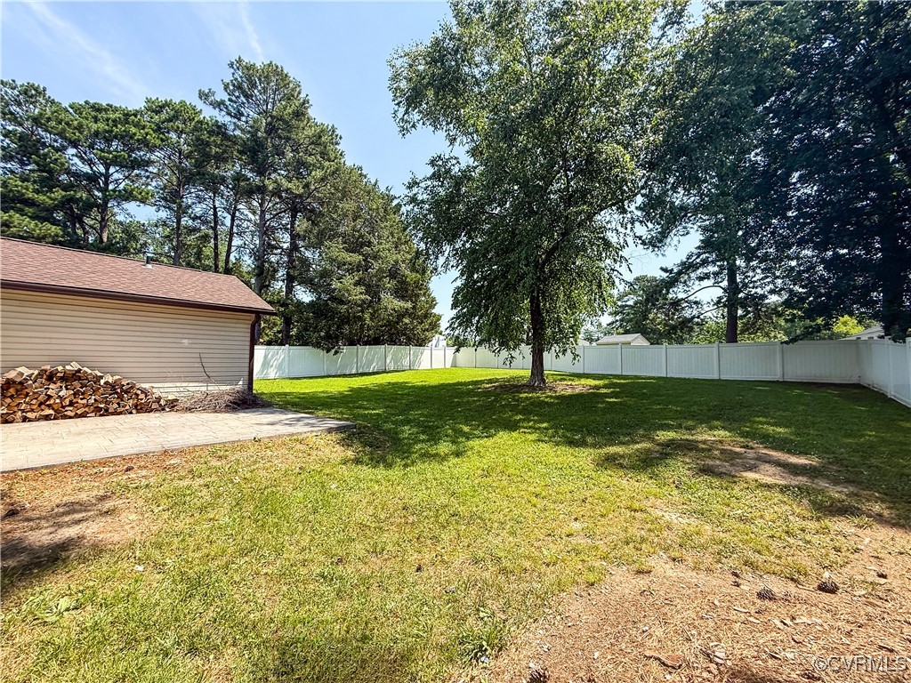 7908 Capistrano Drive Richmond, VA 23227 - Photo 15 of 22 a view of a backyard with large trees