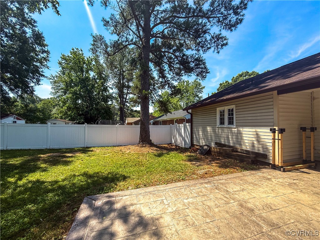 7908 Capistrano Drive Richmond, VA 23227 - Photo 18 of 22 a view of a backyard with a small cabin