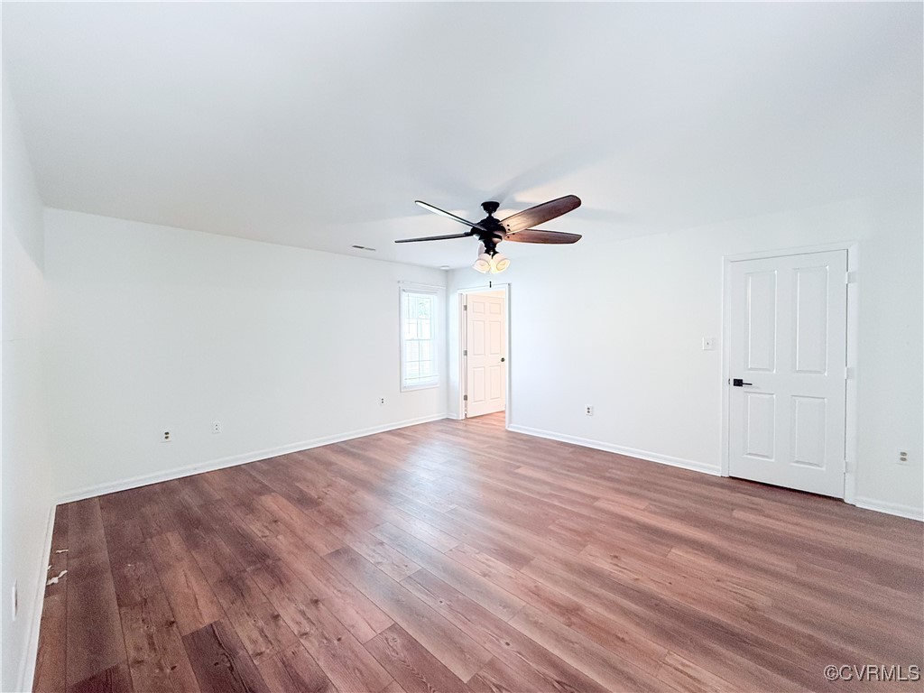 7908 Capistrano Drive Richmond, VA 23227 - Photo 8 of 22 a view of empty room with wooden floor