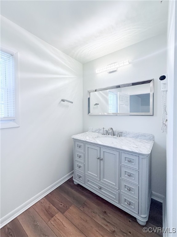7908 Capistrano Drive Richmond, VA 23227 - Photo 9 of 22 a bathroom with a granite countertop sink and mirror