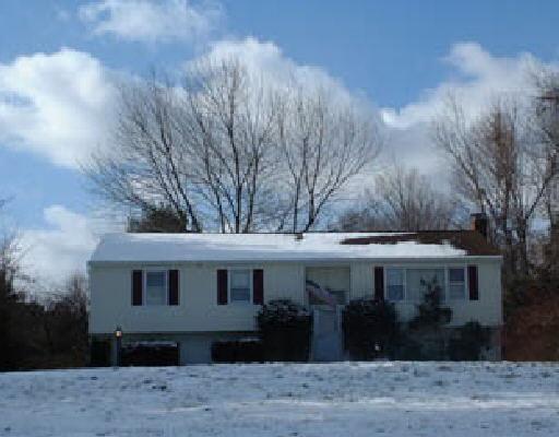 11 Squire Road Monroe, CT 06468 - Photo 1 of 1 a front view of a house with garden