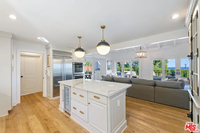 a view of a bathroom from a hallway